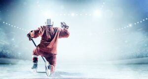 168飞艇官网开奖结果 hockey player in red uniform kneeling on ice